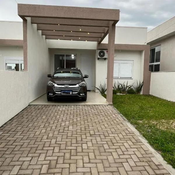 Casa com piscina em Imbé/Rs