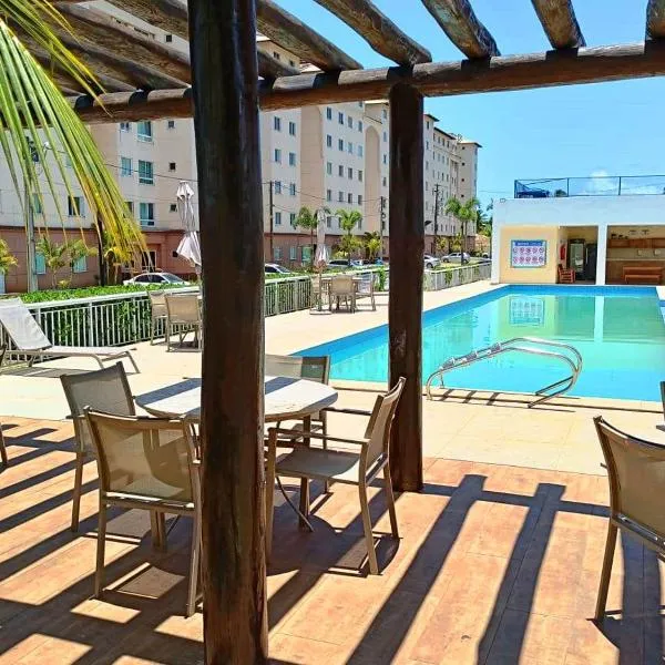 Apartamento aconchegante em condomínio perto da praia