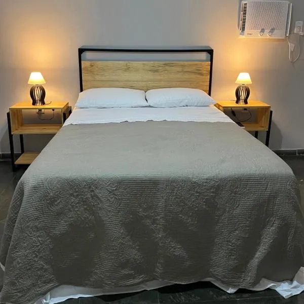 Flat com ar, varanda e linda vista para o Ibituruna - 201