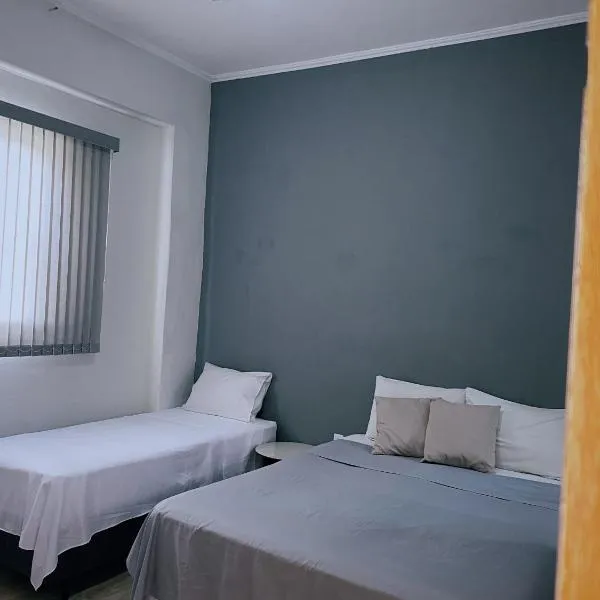 Quarto privativo no centro