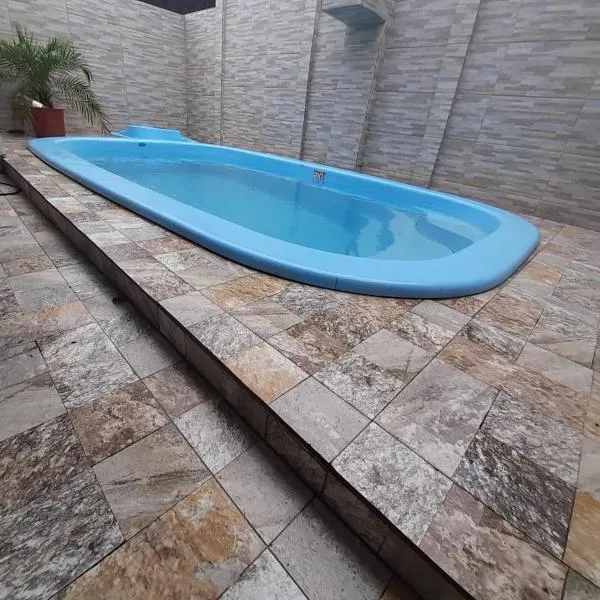 Casa com piscina em Bertioga 700m da praia